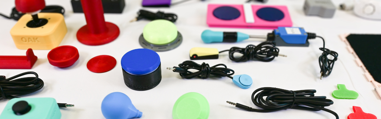 various MMC assistive technology splayed out on a table