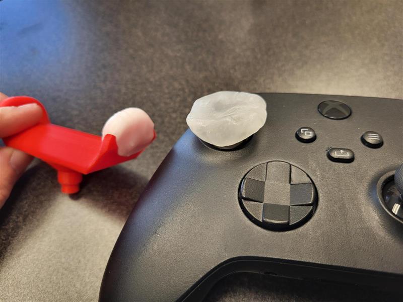 Xbox Controller and joystick topper with added thermoplastic on top to modify the shape.
