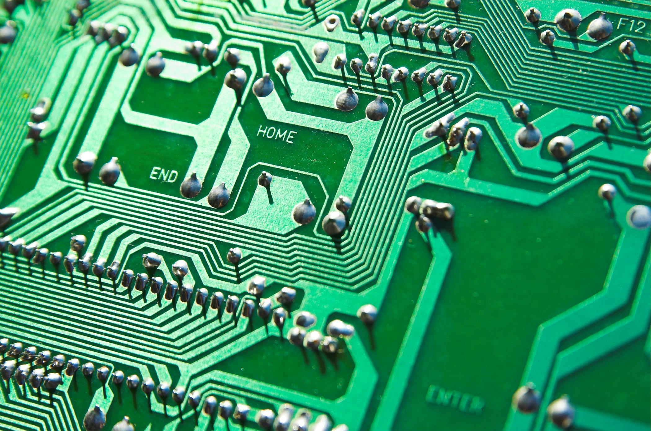 Closeup image of a printed circuit board (PCB).