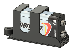 A battery cover holding a 9V battery.